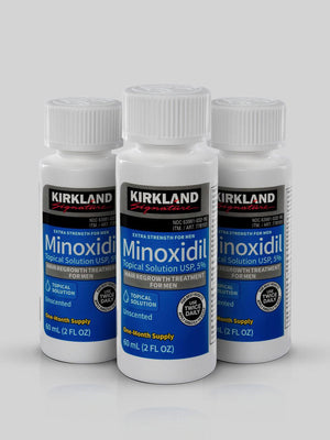 Imagem dos três frascos de Minoxidil Kirkland 5% original com conta-gotas, ideal para tratamento de barba e entradas
